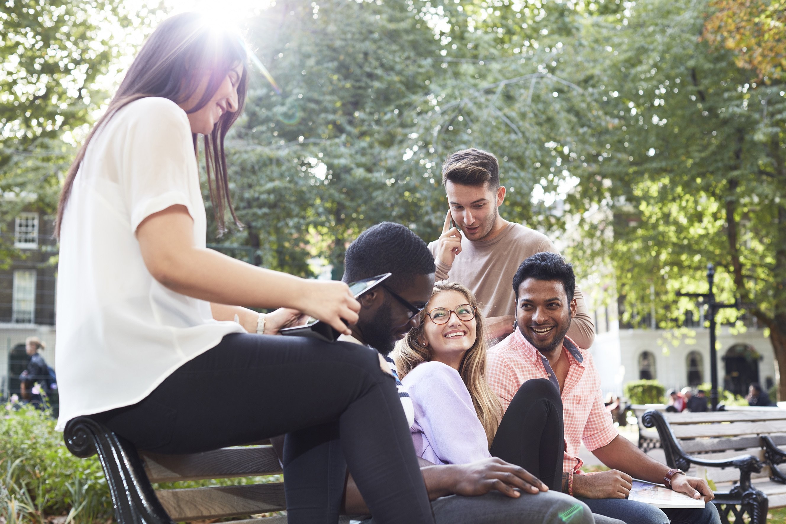 Group of students working outside at the University of London